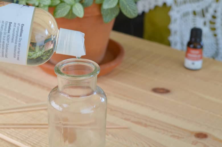 Add 1/4 cup carrier oil to cinnamon reed diffuser